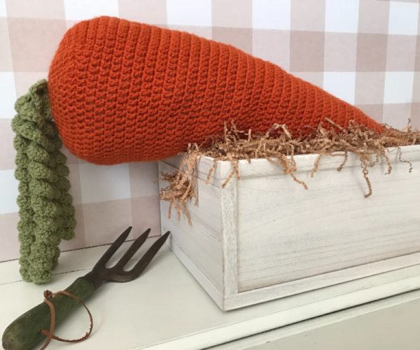 extra-large crochet carrot made in the round with double crochet stitches