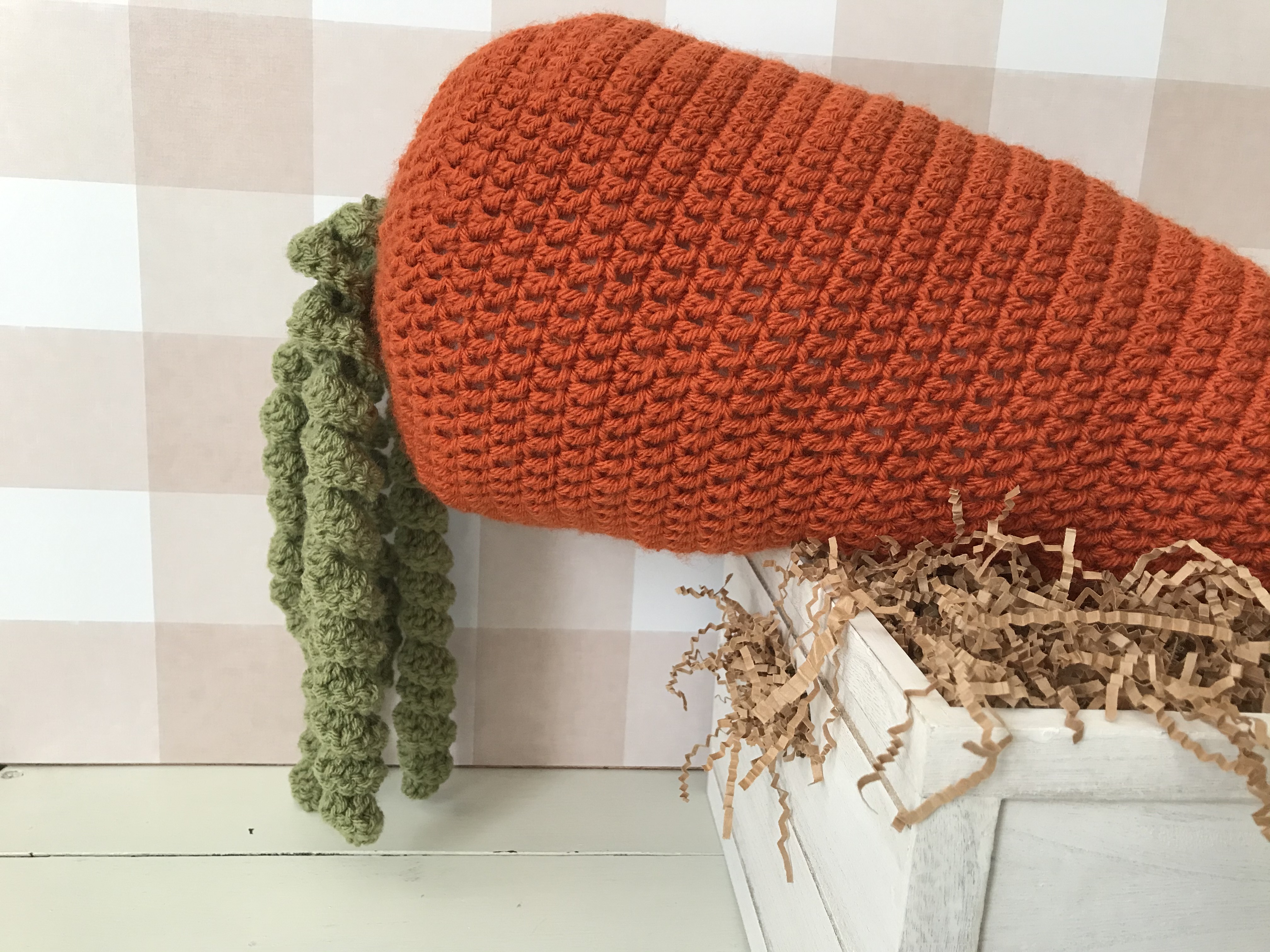 extra-large crochet carrot made in the round with double crochet stitches